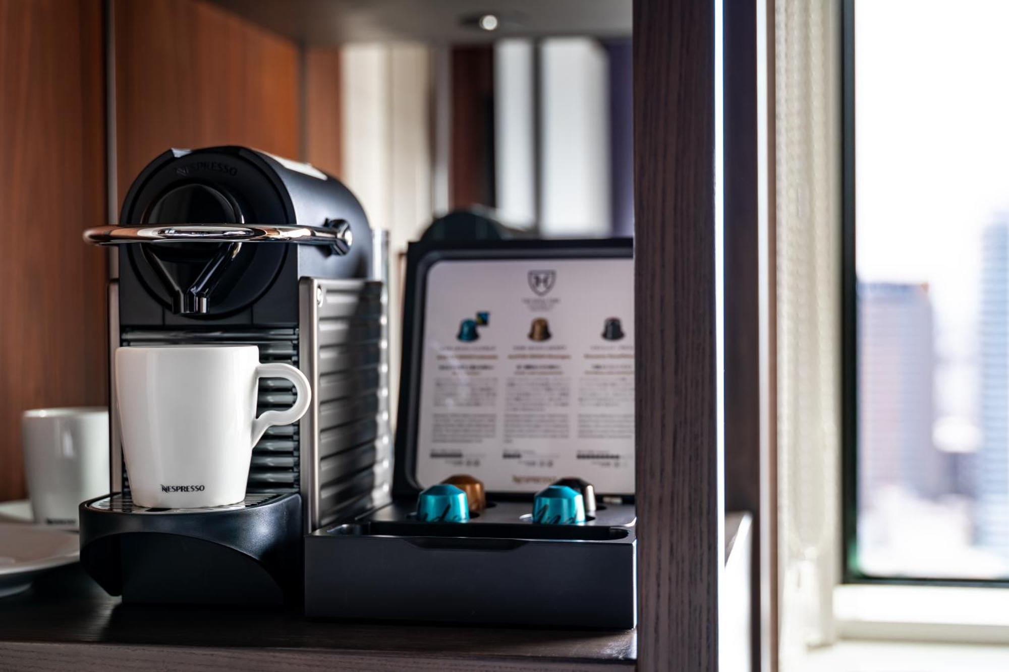 The Royal Park Hotel Iconic Osaka Midosuji Oda fotoğraf A Nespresso coffee machine